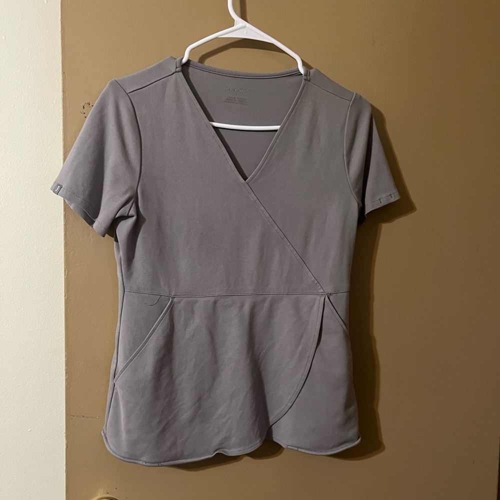 COPY - Jaanuu spinryx tulip mock wrap scrub top. size s grey